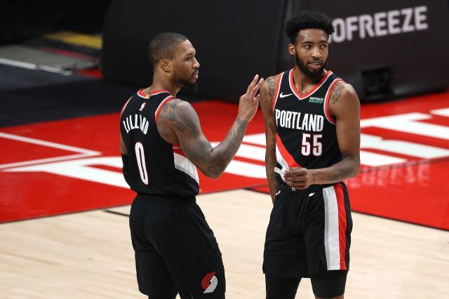 1611899009256048681.jpg DerrickJonesJr.DamianLillard_GettyImages-1297284208.jpg